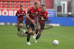 3.Liga - Saison 2022/2023 - FC Ingolstadt 04 -  - FC Freiburg II - Tobias Bech (Nr.11 - FCI) - Jordy Makendo (Nr.4 - SC Freiburg II) - Foto: Meyer Jürgen