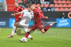 3. Liga; FC Ingolstadt 04 - TSG Hoffenheim II; Zweikampf Kampf um den Ball Gustav Christensen (24, FCI) Erlein Luca (24 TSG)
