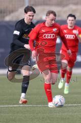 Bayernliga Nord - Saison 2023/24 - FC Ingolstadt 04 II - SpVgg Hankofen-Hailing - Riedl Fabio rot FCI - Blümel Jonas schwarz Hankofen - Foto: Meyer Jürgen