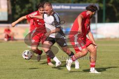 Testspiel - Bezirksliga - Saison 2025/26 - TSV Ober./Unterhaunstadt - Türkisch Ingolstadt  - Baha Asici rot Türkisch  - Florian Diegel weiss Ober./Unterh.stadt - Daniel Drotleff rot #8 Türkisch - Foto: Meyer Jürgen