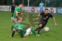 2023_10_21 - Kreisliga - Saison 2023/24 - FC Gerolfing - FC Fatih Ingolstadt - Quirin Nuber grün Gerolfing - Emre Arik schwarz Fatih - Foto: Meyer Jürgen