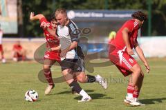 Testspiel - Bezirksliga - Saison 2025/26 - TSV Ober./Unterhaunstadt - Türkisch Ingolstadt  - Baha Asici rot Türkisch  - Florian Diegel weiss Ober./Unterh.stadt - Daniel Drotleff rot #8 Türkisch - Foto: Meyer Jürgen