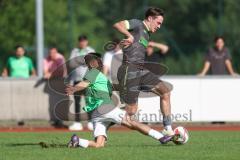 Bezirksliga - Saison 2025/26 - FC Fatih Ingolstadt - FC Gerolfing - Aaron Toski grün Fatih - David Simm (Nr.7 - FC Gerolfing) - Foto: Meyer Jürgen