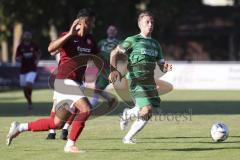 Kreisliga - Saison 2023/2024 - FC Gerolfing - Türk SV Ingolstadt - Lukas Achhammer grün Gerolfing - Halil Balaban rot Türk SV - Foto: Meyer Jürgen