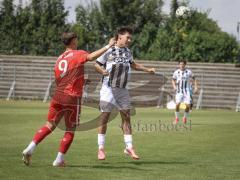 Bayernliga Nord - Saison 2026/27 - FC Ingolstadt 04 II - Jahn Regensburg II - Maximilian Wagner (Nr.20 - FCI II) - Niklas Schicha rot Regensburg - Foto: Meyer Jürgen