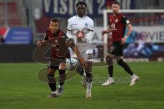 3. Liga - Saison 2023/24 - FC Ingolstadt 04 - Waldhof Mannheim - Marcel Costly (Nr.22 - FCI) - Kennedy Okpala (#32 Mannheim) - Foto: Meyer Jürgen