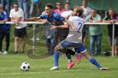 Kreisliga - Saison 2023/2024 - SV Menning - FC Mindelstetten - Simon Wolfsfellner blau Menning Jonas Schoberer weiss Mindelstetten - - Foto: Meyer Jürgen