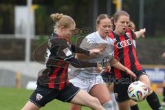 2. Frauen Bundesliga - Saison 2025/26- FC Ingolstadt 04 - VFL Wolfsburg - Stefanie Reischmann (Nr.24 - FC Ingolstadt Frauen I) - Anastasia Harting weiss Wolfsburg - Nina Penzkofer (Nr.29 - FC Ingolstadt Frauen I) links - Foto: Meyer Jürgen