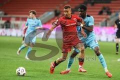 3. Liga; FC Ingolstadt 04 - FC Viktoria Köln; Zweikampf Kampf um den Ball Marcel Costly (22, FCI) Boboy Verthomy (22 VK)