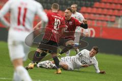 3. Fußball-Liga - Saison 2020/2021 - FC Ingolstadt 04 - FC Viktoria Köln - Tobias Schröck (#21,FCI)  wird gefoult - Foto: Meyer Jürgen