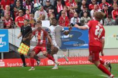 3. Liga - Saison 2023/24 - Rot-Weiss Essen - FC Ingolstadt 04 -  - Sascha Voelcke (#2 Essen) - Bryang Kayo (Nr.48 - FCI) - Foto: Meyer Jürgen