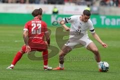 3. Liga - Saison 2023/24 - Rot-Weiss Essen - FC Ingolstadt 04 -  - Jose Enrique Rios Alonso (#23 Essen) - Draculic Ognjen (Nr.30 - FCI) - Foto: Meyer Jürgen