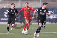 Bayernliga Nord - Saison 2023/24 - FC Ingolstadt 04 II - SpVgg Hankofen-Hailing - Riedl Fabio rot FCI - Blümel Jonas schwarz Hankofen - Foto: Meyer Jürgen