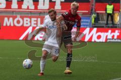 3.Liga - Saison 2022/2023 - FC Ingolstadt 04 -  SV Meppen - Tobias Bech (Nr.11 - FCI) - David Blacha (Nr.23 - SV Meppen) - Foto: Meyer Jürgen