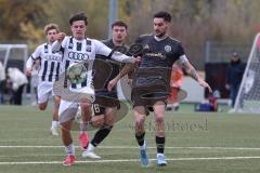 Bayernliga Nord - Saison 2026/27 - FC Ingolstadt 04 II - SV Fortuna Regensburg - Timo Hengmith weiss FCI - Andrea Nocerino dunkel Regensburg -  Foto: Meyer Jürgen