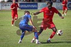 Kreisliga - Saison 2026/27- TSV Großmehring - SV Zuchering - Denis Hirschberger blau Großmehring - Glenn Heicappell rot Zuchering - Foto: Meyer Jürgen