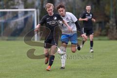 2023_11_12 - SV Hundszell - SV Karlskron   - Kreisliga - Saison 2023/24  - Samuel Tkac weiss Karlskron - Paul Amann schwarz Hundszell - Foto: Meyer Jürgen