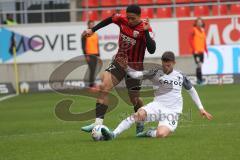 3.Liga - Saison 2022/2023 - FC Ingolstadt 04 -  - FC Freiburg II -Udogu David (Nr.47 - FCI) - Patrick Lienhard (Nr.8 - SC Freiburg II) -  Foto: Meyer Jürgen