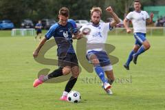 Kreisliga - Saison 2023/2024 - SV Menning - FC Mindelstetten - Simon Wolfsfellner blau Menning schiesst den 1:0 Führungstreffer - jubel - - Jonas Schoberer weiss Mindelstetten - Foto: Meyer Jürgen