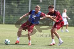 3. Liga; FC Ingolstadt 04 - Trainingsauftakt nach Sommerpause; Lars Lokotsch (13, FCI) Elias Decker (4, FCI)
