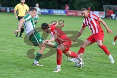 Landesliga - Saison 2025/26 - SV Manching - TSV Dachau  - Sebastian Graßl (Nr.10 - SV Manching) - Ruben Milla Nava rot Dachau - Foto: Meyer Jürgen