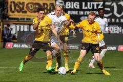 3.Liga - Saison 2022/2023 - Dynamo Dresden - FC Ingolstadt 04 - Tobias Bech (Nr.11 - FCI) - Jonathan Meier (Nr.8 - Dynamo Dresden) - Paul Will (Nr.28 - Dynamo Dresden) - Foto: Meyer Jürgen