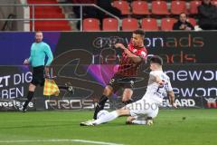 3. Liga; FC Ingolstadt 04 - Erzgebirge Aue; Zweikampf Kampf um den Ball Marcel Costly (22, FCI) Rosenlöcher Linus (29 Aue)