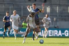 2024_1_27 - 3. Liga - Saison 2023/24 - 1. FC Saarbrücken - FC Ingolstadt 04 -  - Bryang Kayo (Nr.48 - FC Ingolstadt 04) - Marcel Gaus (Nr.19 - 1. FC Saarbrücken) - Foto: Meyer Jürgen