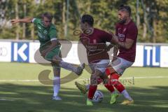 Kreisliga - Saison 2023/2024 - FC Gerolfing - Türk SV Ingolstadt - Lukas Achhammer grün Gerolfing - Marijan Maricic rot links Türk SV - Fabian Reichenberger rot rechts Türk SV - Foto: Meyer Jürgen