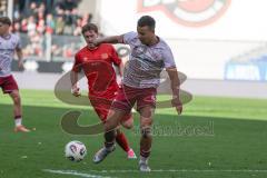 3. Liga - Saison 2025/26 - SV Wehen/Wiesbaden - FC Ingolstadt 04  - Fabian Greilinger (Nr.18 - Wiesbaden) - Marcel Costly (Nr.22 - FCI) - Foto: Meyer Jürgen