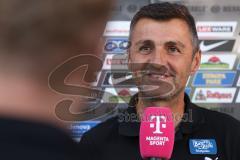 3.Liga - Saison 2023/2024 - SC Freiburg II - FC Ingolstadt 04 - Cheftrainer Michael Köllner (FCI) - im Interview mit Magenta Sport - Foto: Meyer Jürgen