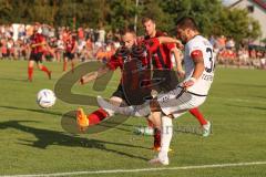 Toto Pokal - Saison 2022/2023 - SpVgg Heßdorf - FC Ingolstadt 04 - Pascal Testroet (Nr.37 - FCI) - Nick Ackermann (Nr.23 - SpVgg Hessdorf). -Foto: Meyer Jürgen