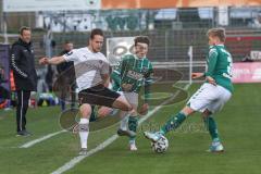 3. Liga - VfB Lübeck - FC Ingolstadt 04 - Zweikampf Michael Heinloth (17, FCI) Lucas Wolf (35 Lübeck) Hertner Sebastian (3 Lübeck)