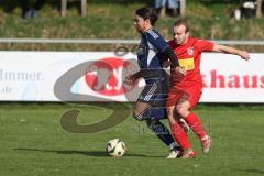 Kreisliga - Saison 2025/26- TSV Kösching - TV Münchsmünster - Andre Bräuning blau Münchsmünster - Jonas Betz rot Kösching - Foto: Meyer Jürgen