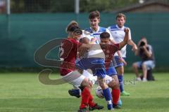 Kreisliga - Saison 2023/2024 - Türk SV Ingolstadt - TSV Mümchsmünster - Melih Soysal rot Türk SV #52 - Maximilian Anthofer weiss M-münster rechts - Baha Asici #42 rot Türk Sv - Foto: Meyer Jürgen