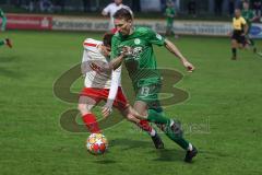 Landesliga - Saison 2024/25 - SV Manching - FC Gundelfingen - Johannes Dexl (Nr.13 - SV Manching) - Richard Gumpinger weiss Gundelfingen - Foto: Meyer Jürgen