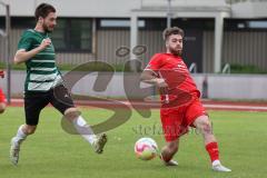 Bezirksliga - Saison 2022/2023 - FC Fatih Ingolstadt - VSST Günzelhofen - Roin Koblianidze rot Fatih  - Paul Fischer grün Günzelhofen - Foto: Meyer Jürgen