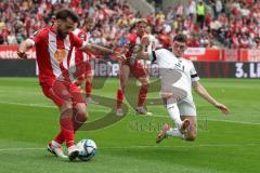 3. Liga - Saison 2023/24 - Rot-Weiss Essen - FC Ingolstadt 04 -  - Felix Keidel (Nr.43 - FCI) - Jose Enrique Rios Alonso (#23 Essen) - Foto: Meyer Jürgen