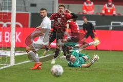 3. Fußball-Liga - Saison 2020/2021 - FC Ingolstadt 04 - FC Viktoria Köln - Filip Bilbija (#35,FCI)  - Dennis Eckert Ayensa (#7,FCI)  - Sebastian Mielitz Torwart (#1 Köln) - Foto: Meyer Jürgen