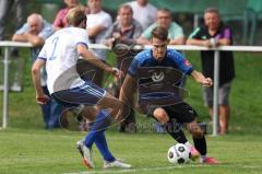 Kreisliga - Saison 2023/2024 - SV Menning - FC Mindelstetten - Simon Wolfsfellner blau Menning Jonas Schoberer weiss Mindelstetten - - Foto: Meyer Jürgen