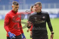 3. Liga - MSV Duisburg - FC Ingolstadt 04 - Torwarttrainer Alexander Kunze (FCI) mit Torwart Fabijan Buntic (24, FCI) nach dem Warmup