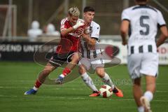 Saison 2026/27 - Freundschaftsspiel - 1. FC Nürnberg - FC Ingolstadt 04 - Sigurd Haugen (Nr.9 - FCN) - Georgios Antzoulas (Nr.6 - FCI) - Foto: Meyer Jürgen