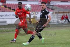 Bayernliga Süd - Saison 2022/2023 - FC Ingolstadt 04 - FC Memmingen - Ibrahim Madougou (Nr.9 - FCI II) - Jakob Gräser schwarz Memmingen - Foto: Meyer Jürgen