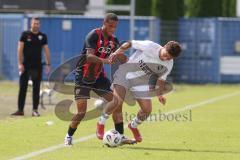 *** Bayernliga Nord - Saison 2025/26 - FC Ingolstadt 04 II - ATSV Erlangen - Micah Ham (Nr.25 - FC Ingolstadt II) - Lukas Kuschka weiss Erlangen - Foto: Meyer Jürgen