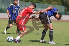 Testspiel - Bezirksliga - Saison 2025/26 - FC Fatih Ingolstadt - TSV Burgheim - Aaron Toski rot Fatih - Nick Vogel blau Burgheim  - Foto: Meyer Jürgen