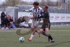 Bayernliga Nord - Saison 2026/27 - FC Ingolstadt 04 II - SV Fortuna Regensburg - Maximilian Wagner weiss FCI - Julian Ziegler dunkel Regensburg -  Foto: Meyer Jürgen