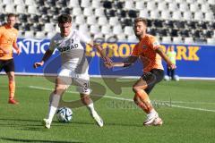 3.Liga - Saison 2023/2024 - SC Freiburg II - FC Ingolstadt 04 - Yannick Deichmann (Nr.20 - FCI) - Lukas Ambros (Nr.36 - Freiburg II) - Foto: Meyer Jürgen