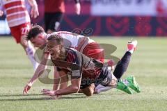 3. Liga; SSV Jahn Regensburg - FC Ingolstadt 04; Zweikampf Kampf um den Ball Marcel Costly (22, FCI) Viet Christian (10 Jahn)