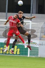 3.Liga - Saison 2022/2023 - SC Freiburg II - FC Ingolstadt 04 -  Calvin Brackelmann (Nr.17 - FCI) - Daniels Kyereh (Nr.11 - SC Freiburg II) - - Foto: Meyer Jürgen