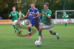 Kreisliga - Saison 2023/2024 - FC Gerolfing - TSV Ober/Unterhaunstadt - Timo Kraus grün Gerolfing - Nick Wagner
 blau Oberhaunstadt - Foto: Meyer Jürgen